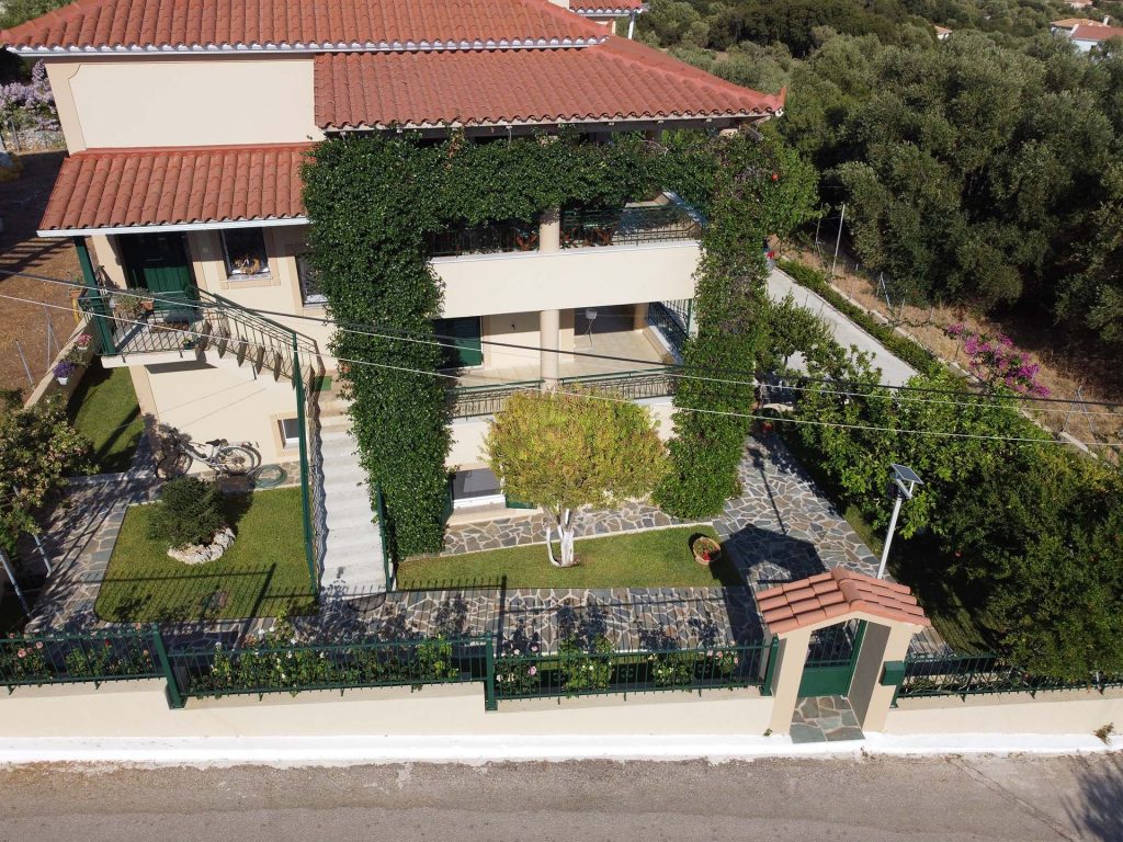 Aerial view of Strelitzia Apartments and garden in Karavados, Kefalonia